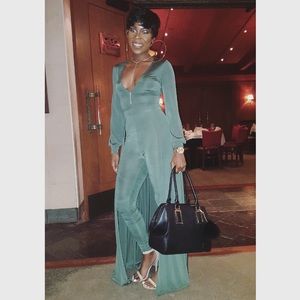 Green jumpsuit with a train